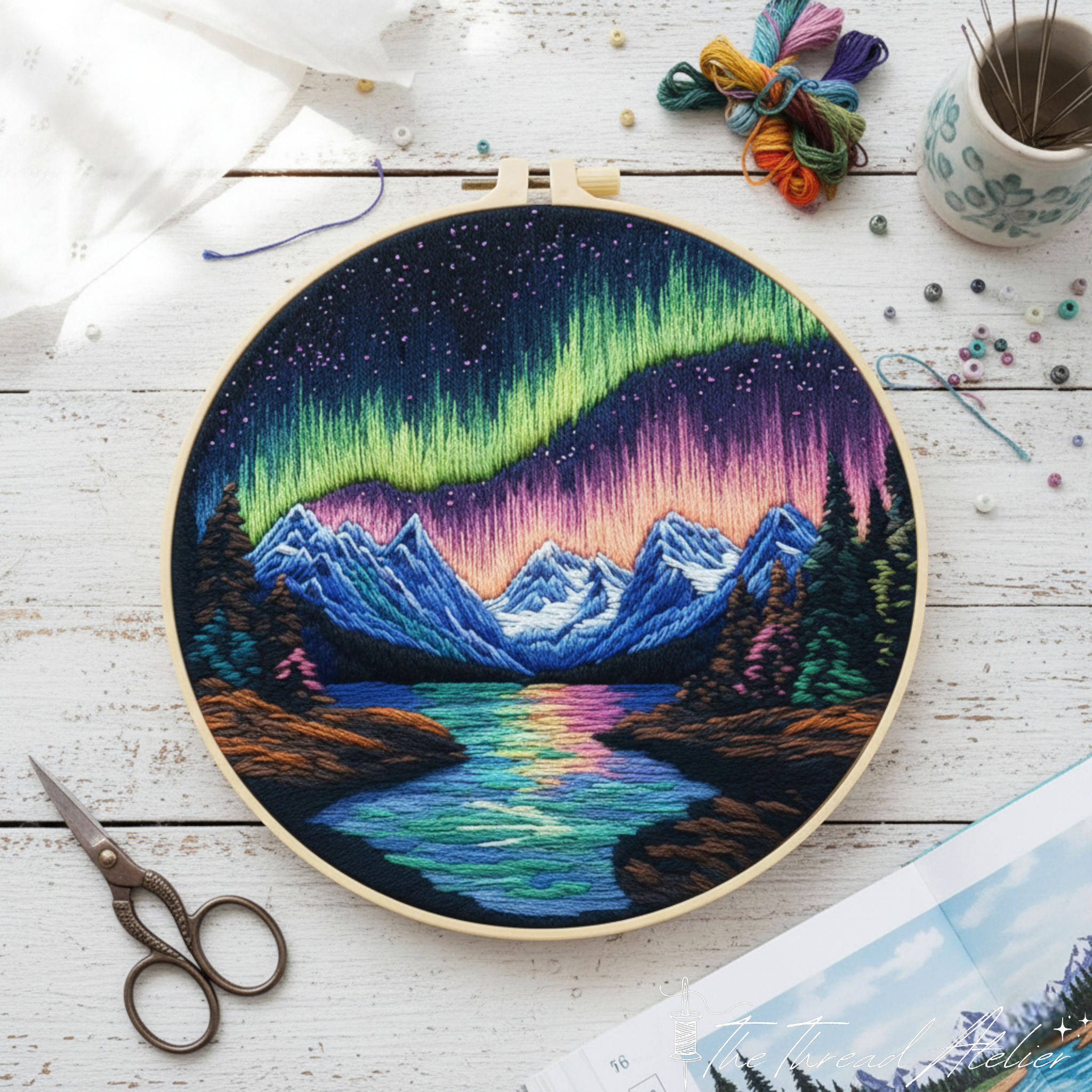 Detail of the aurora sky and mountain silhouette stitches