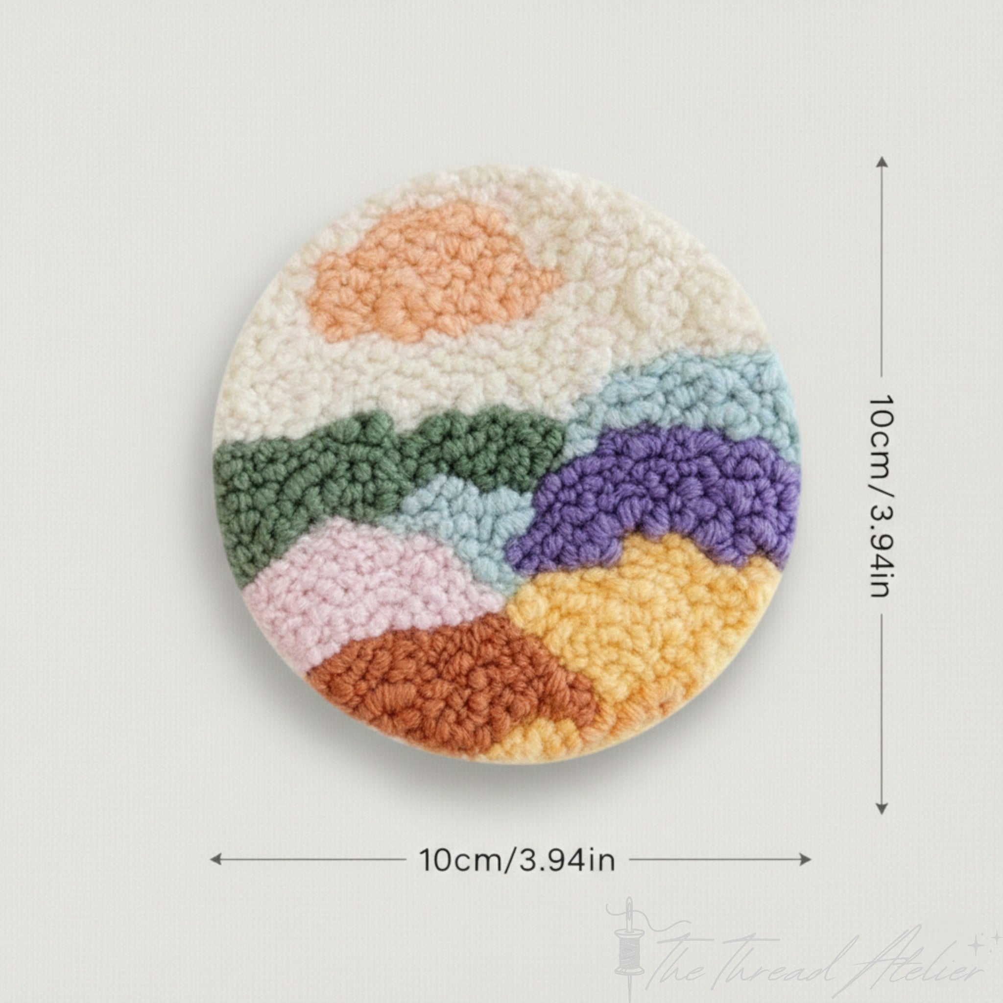 Abstract horizon punch needle coasters arranged as a set