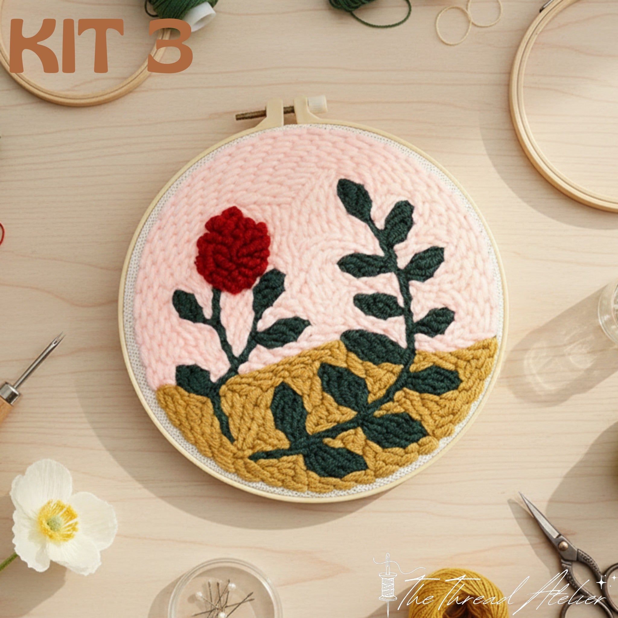 Punch needle flower hoop displayed as contemporary wall art