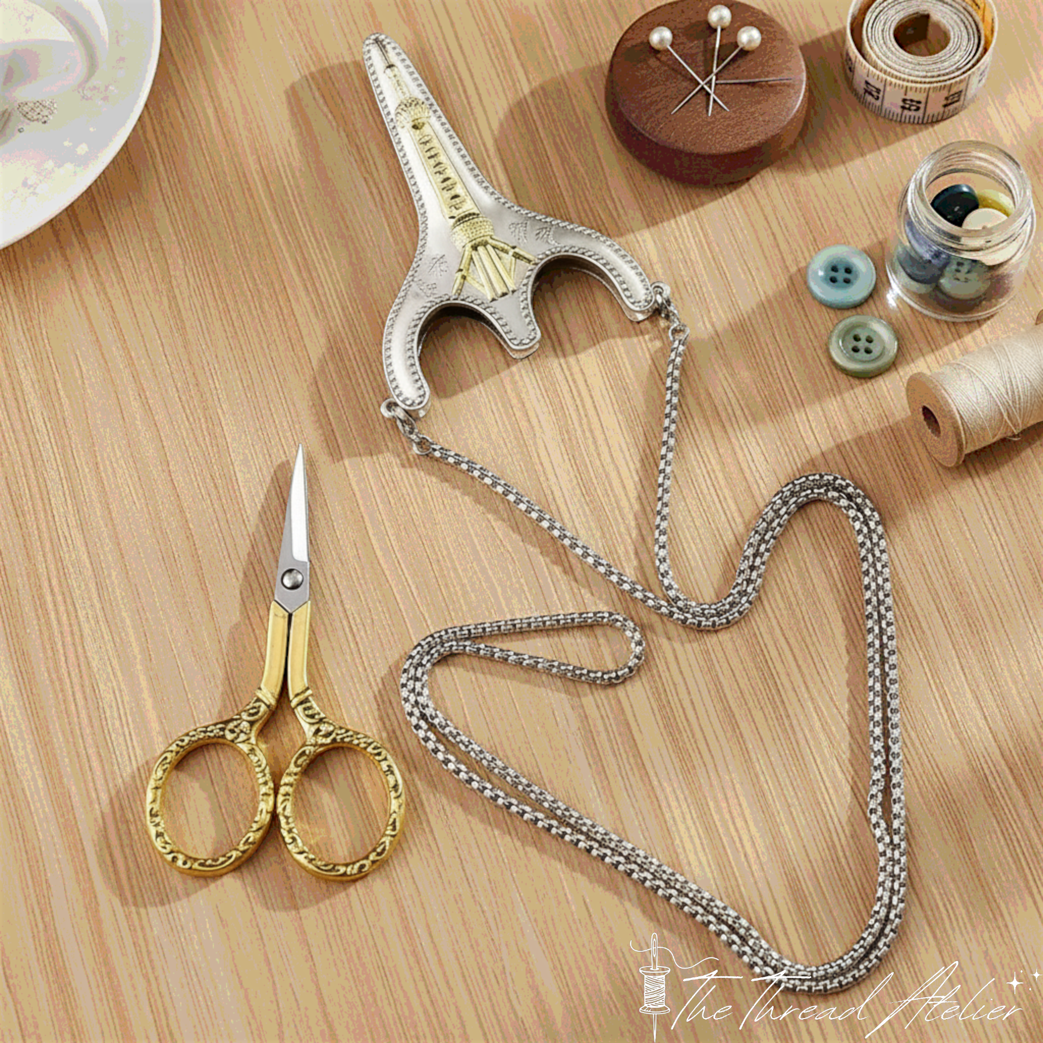 Close view of the ornate handles on the retro sewing scissors
